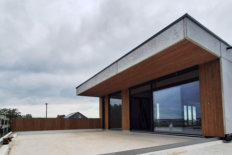 Gevelbekleding voor retailproject te Maldegem