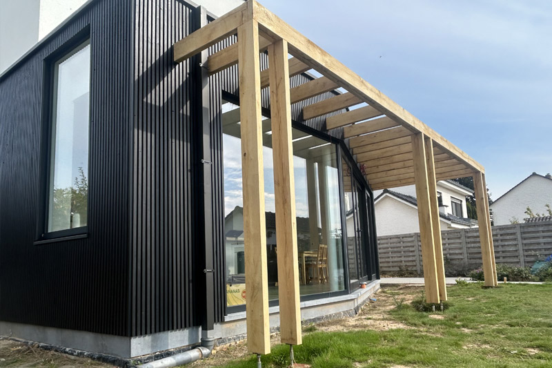 Gevelbekleding en woninguitbreiding in Oudenaarde