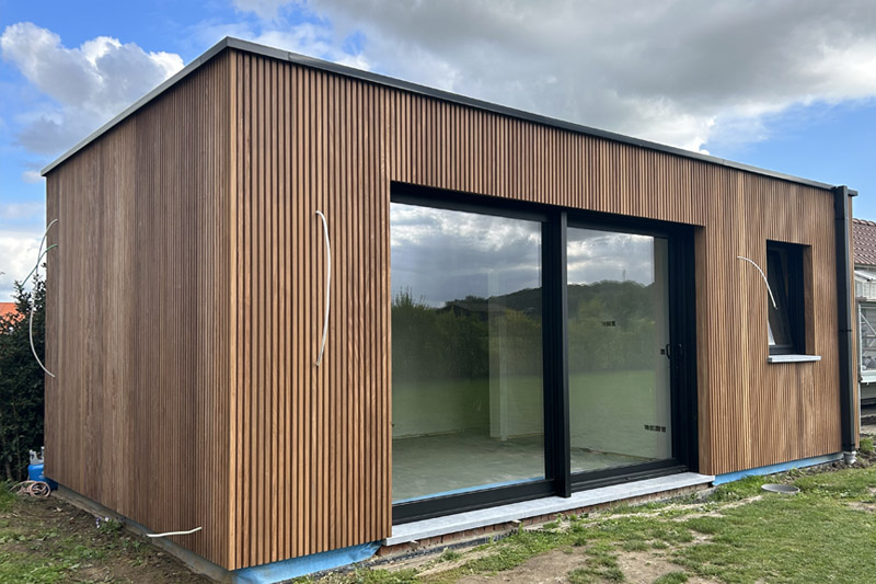 Tuingebouw in Wortegem met padouk gevelafwerking