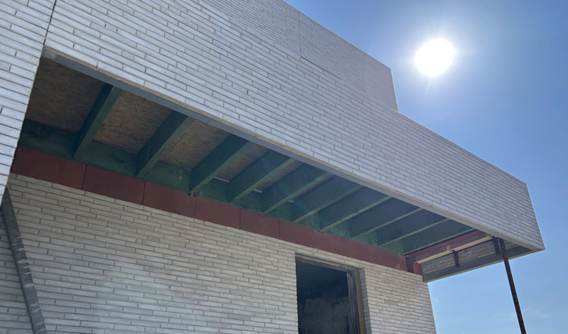 Uitwerken van luifels te Appelterre